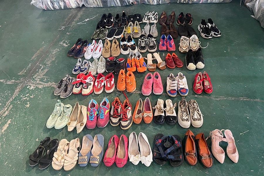 rows of used ladies shoes